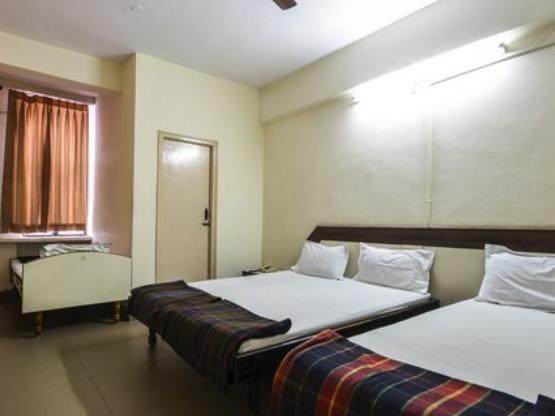Hotel Maya Deluxe Haïdarabad Chambre photo